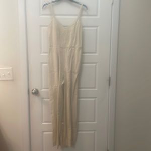 Universal Thread jumpsuit. Small straps, zips up the side.